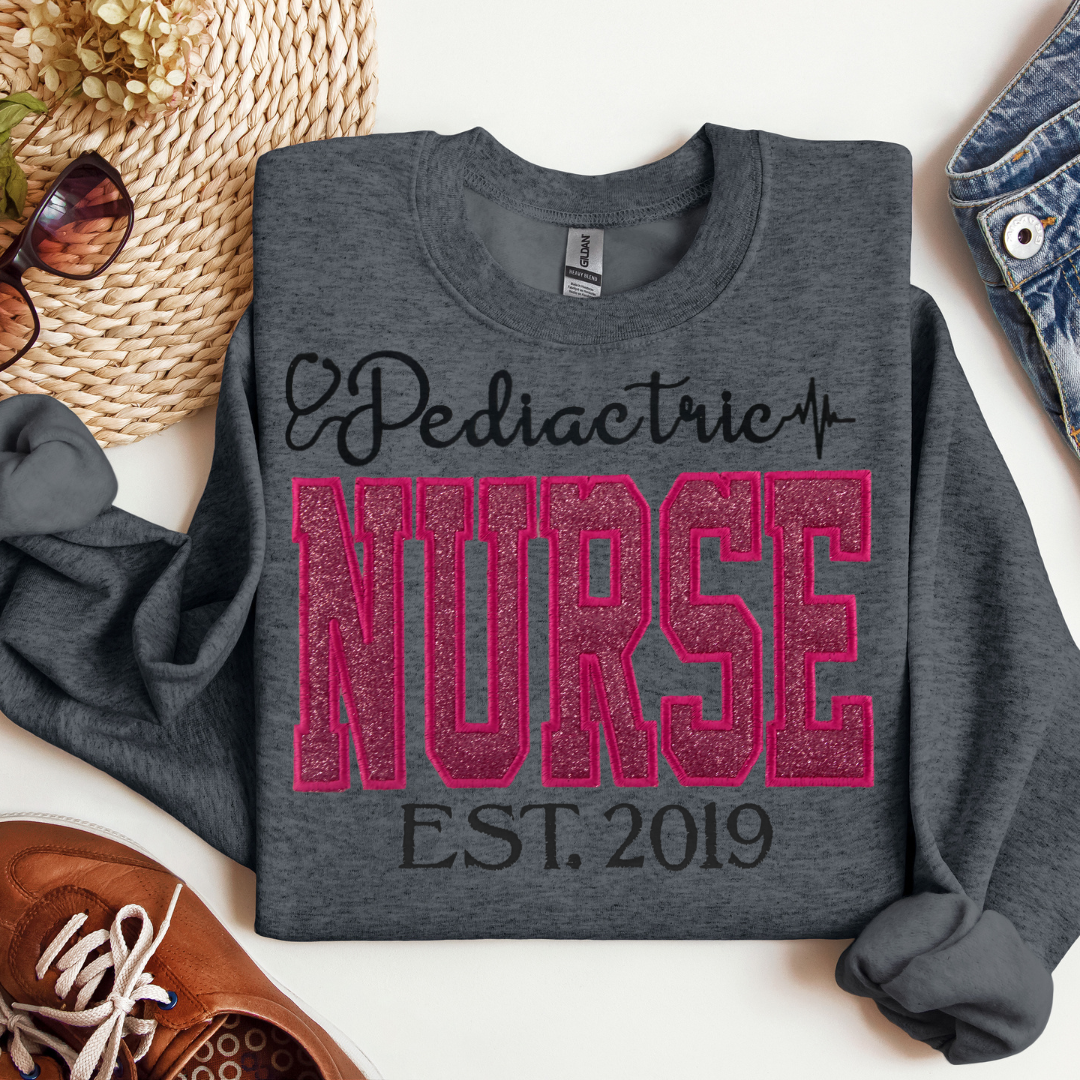 Trendy Pink Glitter Pediatric Care Nurse Hoodie-Cute Embroidery Style