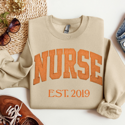 Orange Nurse Embroidery Crewneck